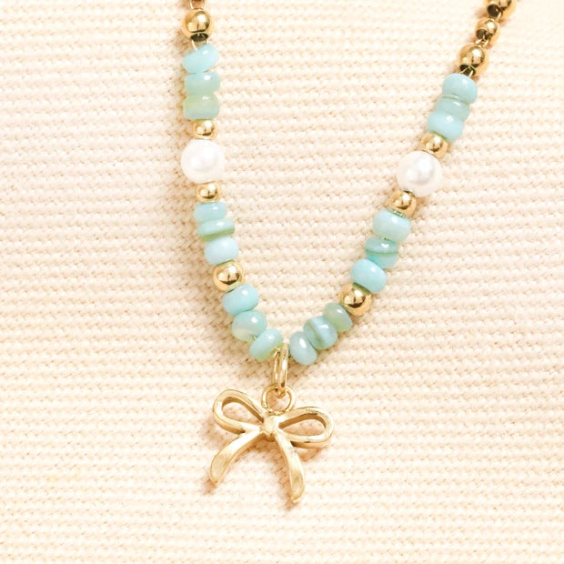 Stainless Steel Bow Charm Green Beaded Necklace in Gold